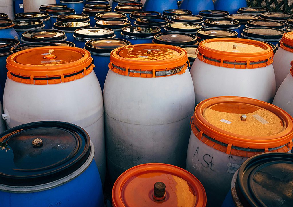 A large amount of plastic barrels gathered together