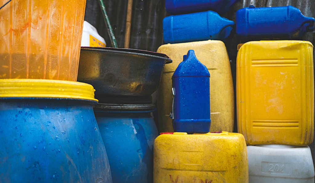 Multiple different sized and coloured plastic bottles and containers